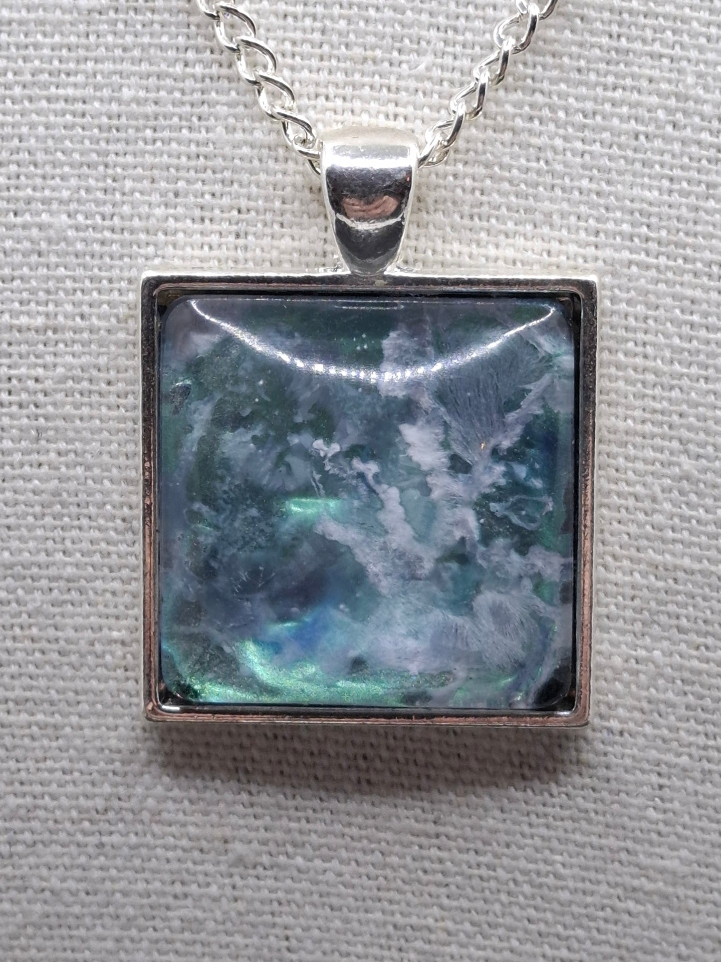 Handcrafted  epoxy and stainless steel pendant