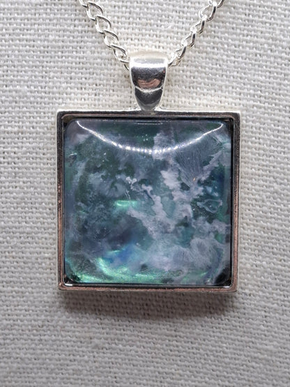 Handcrafted  epoxy and stainless steel pendant