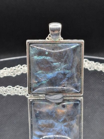 Handcrafted  epoxy and stainless steel pendant