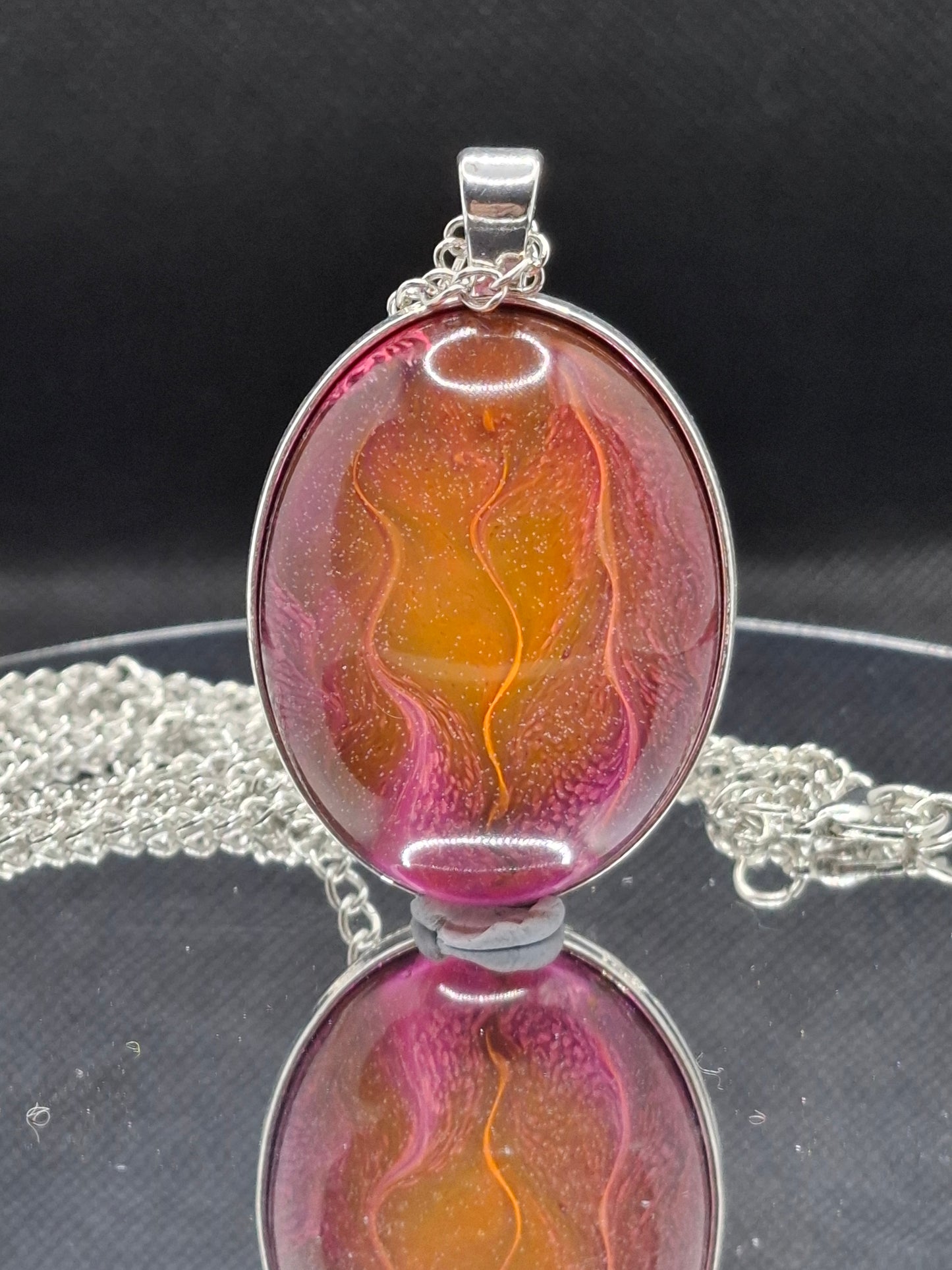 Handcrafted  epoxy and stainless steel pendant