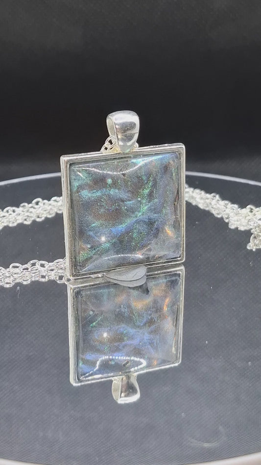 Handcrafted  epoxy and stainless steel pendant