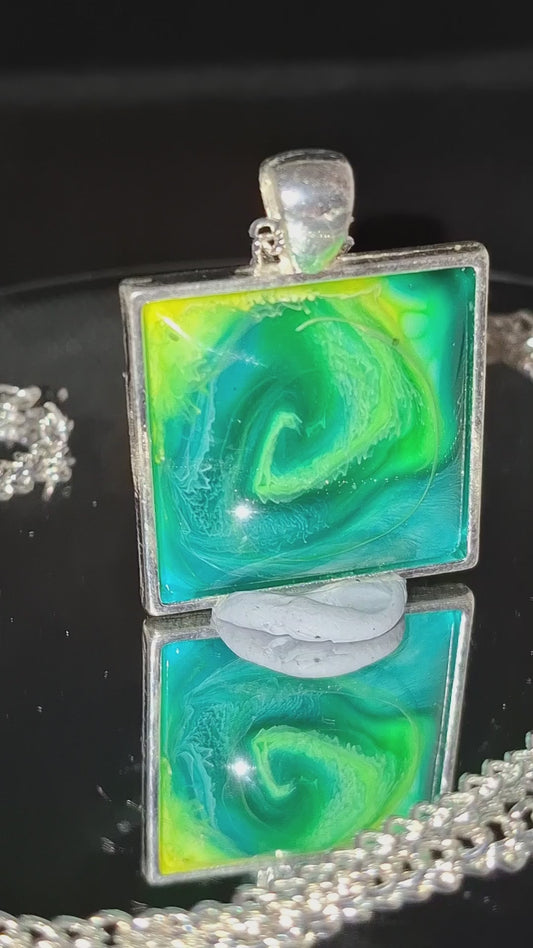 Handcrafted  epoxy and stainless steel pendant